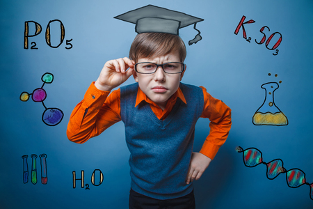 teacher chemistry teenage boy student he thinks the glasses serious infographics formula sketchの写真素材