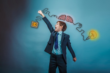 boy businessman raised his hand up and yells call manual initiation charge charging cord plug wires and sketch infographicsの写真素材