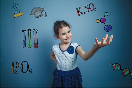 teen girl chemistry teenage student he holds the molecule in hand sketch formula infographicsの写真素材