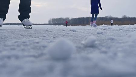 girl skating on ice, winter beautiful view, sport winter a holidaysの写真素材