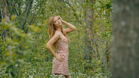 beautiful girl in the spring forestの写真素材