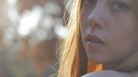 close up a girl smiling in the sun
