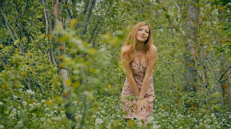 beautiful girl in the spring forestの写真素材