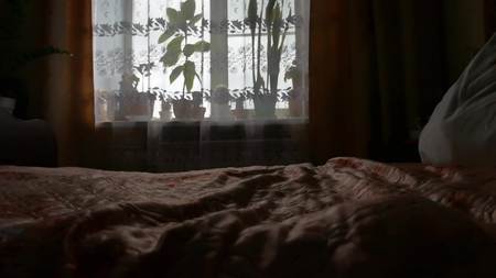 comfort and bedding concept - bed at home bedroomの写真素材