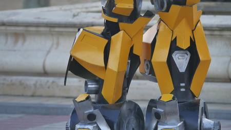 Feet of the foot of the yellow robot. Transformer robot terribleの写真素材
