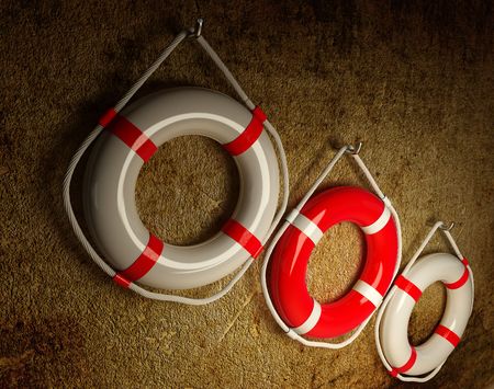 Lifebouys on wall. 3dの写真素材