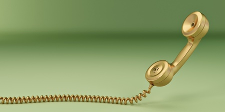 Phone reciever on green isolated background. 3dの写真素材