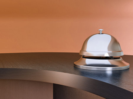 Hotel bell on the table. Reception. 3d