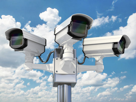 CCTV security camera on cloud sky background. 3d