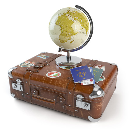 Travel or tourism concept. Old suitcase with stickers, globe and passports with boarding pass tickets isolated on white background. 3d illustrationの写真素材