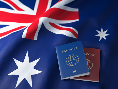Travel, tourism  or immigration in Australia concept. Different passports on Australian flag.の写真素材