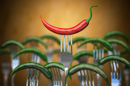 Red hot chili pepper stuck on the forkの写真素材