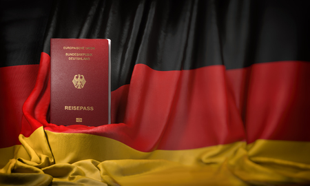 German passport on the flag of Germany.の写真素材