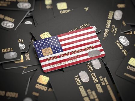 Credit card of american bank on the heap of other different black cards.の写真素材