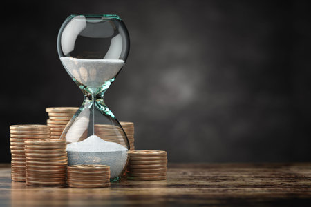 Golden coins and hourglass clock. Return on investment, deposit, growth of income and savings, time...