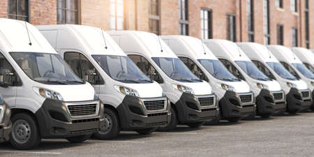 Delivery vans in a row. Express delivery and shipment service concept. 3d illustrationの写真素材