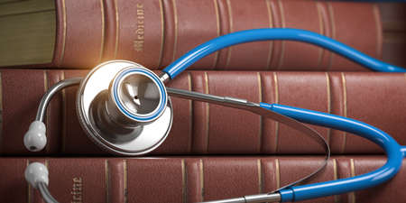 Stethoscope and medical books. Studying medicine and medical education concept.の写真素材