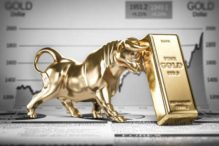 Golden ingot and bull on graph. Bull market trend in gold. 3d illustrationの写真素材