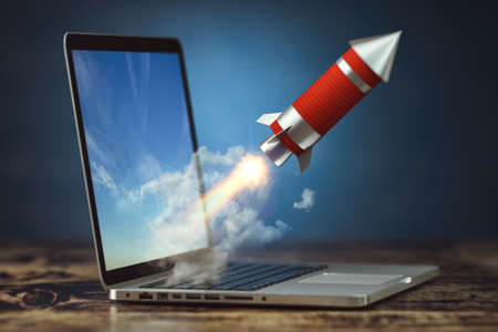 Rocket launch from laptop. Launching start up or new business project. 3d illustrationの写真素材