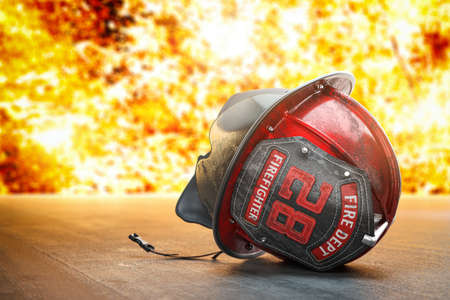 Damaged firefighter helmet on a floor with fire flames on background. Bangerous and hard work of a firefighter concept. 3d illustrationの写真素材