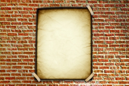 Old Orange Paper on Red Brick-Wallの写真素材