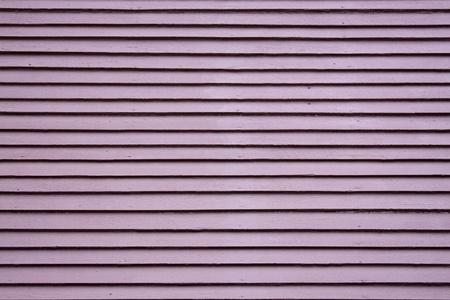 Slice the cherry siding on old house. の写真素材