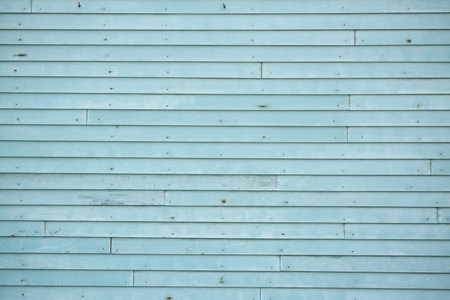 Slice the blue siding on old house.