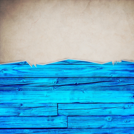 Riped old paper on grunge wall backgroundの写真素材