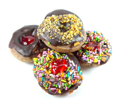 mini doughnuts with Chocolate on White Backgroundの写真素材