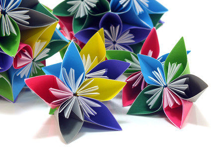 origami colorful flowers isolated on white backgroundの写真素材