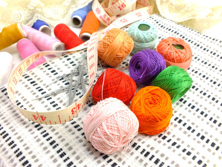 multicolor sewing threads on white background