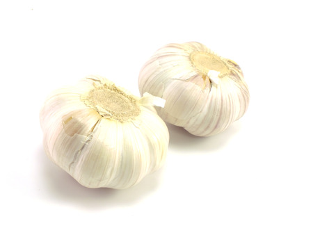 garlic isolated on white backgroundの写真素材