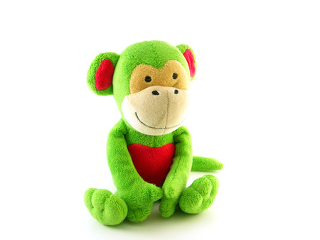 little monkey doll on white backgroundの写真素材