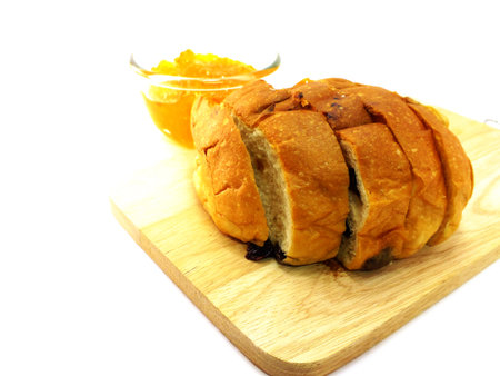slice rasin bread and orange jam