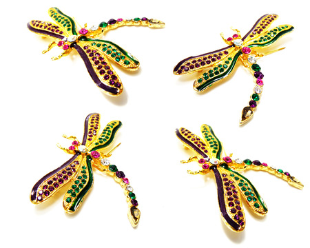 dragonfly jewellry brooch isolated on black backgroundの写真素材