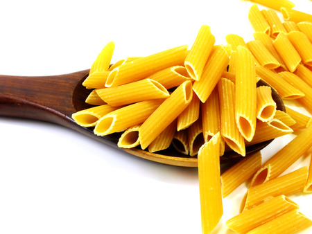 macaroni italian pasta close up on white backgroundの写真素材