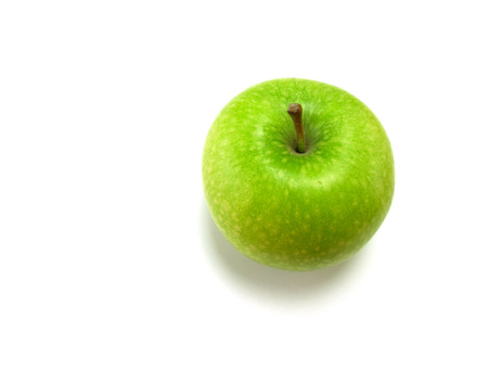 green apple on white backgroundの写真素材