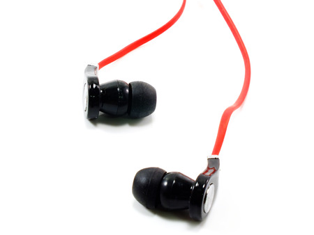 black and red earphones on white backgroundの写真素材