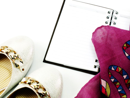 shoes and scarft woman accessories on white background top view with space for textの写真素材