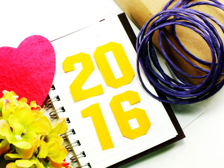 vintage happy new year background happy new year lettering with the gift on wooden background