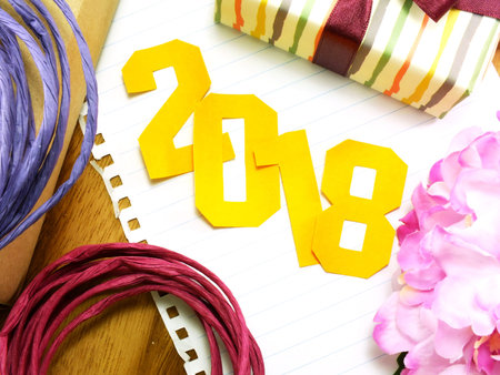 vintage happy new year background happy new year lettering with the gift on wooden backgroundの写真素材