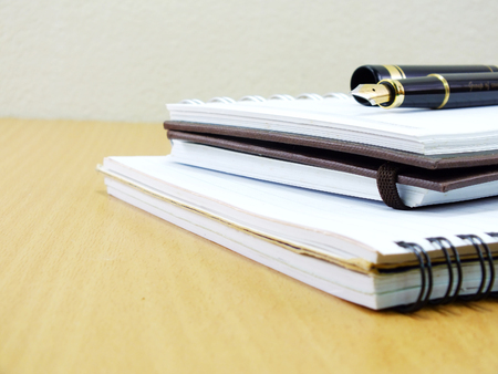 open notebook and pen for writingの写真素材