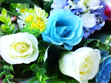 fake roses plastic roses lot of artificial flowersの写真素材