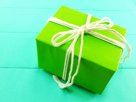 Green box tied with a ropeの写真素材