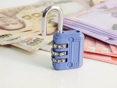 concept of saving money lock on background close up