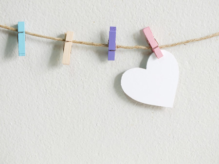 heart symbol hanging wit ropeの写真素材