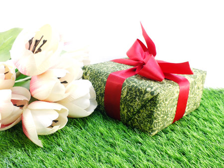 present gift box and flowers artificial bouquet