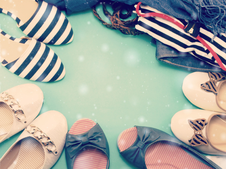 collection of ladies flat shoes with space copy background made with vintage filterの写真素材