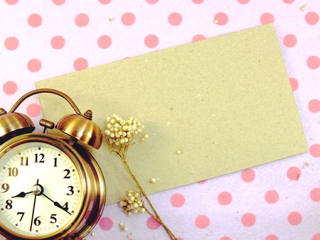 clock with space backgroun with dried flower decorateの写真素材