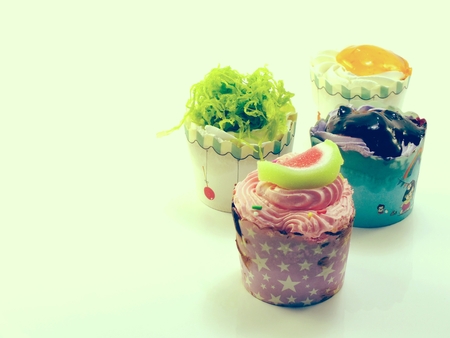 cupcakes on white background filtered image processed vintage effectの写真素材